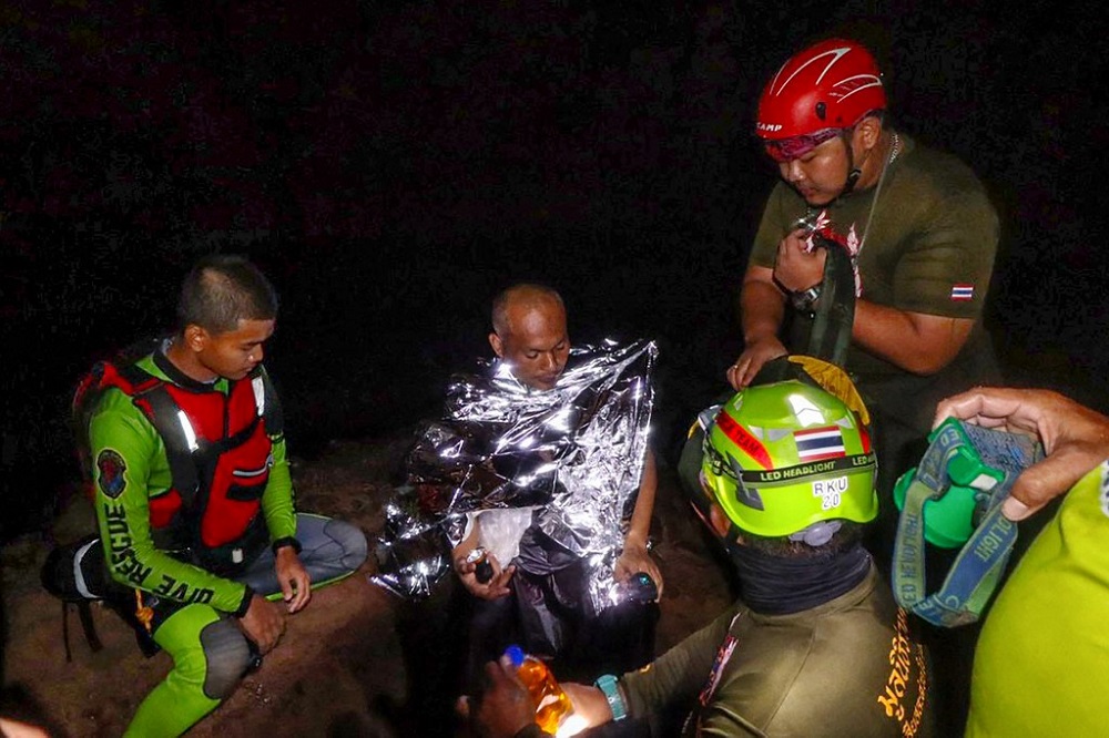 Meditating monk rescued from flooded cave in Thailand
