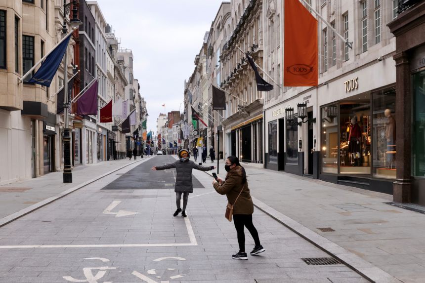 Shops, pub gardens reopen in England's 'major step' to freedom from Covid-19 restrictions