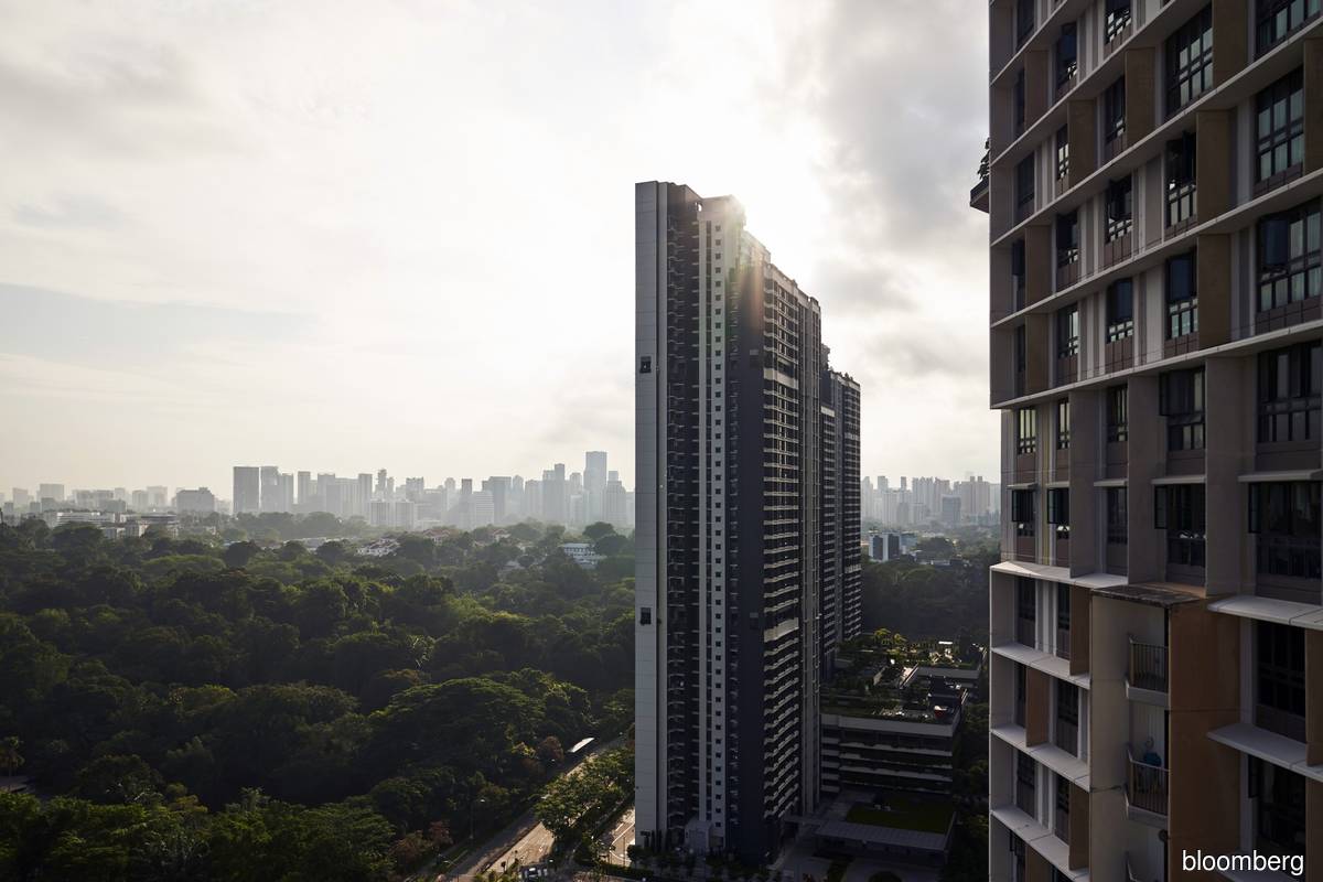 Singapore property market heats up with jump in home sales