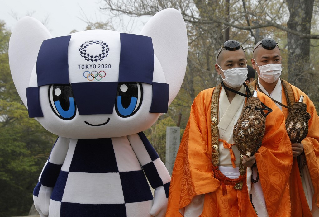 Japan to expand COVID emergency, casting fresh doubts on Olympics