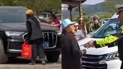 患精神病老妇拦车要钱　警车也不能幸免