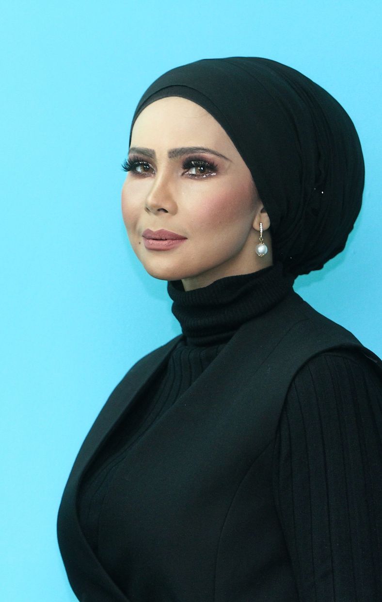 Rozita has 20 outfits prepared for Hari Raya