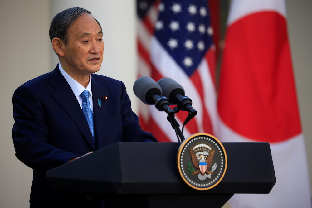 Olympic president Bach to visit Japan in May, meet PM Suga