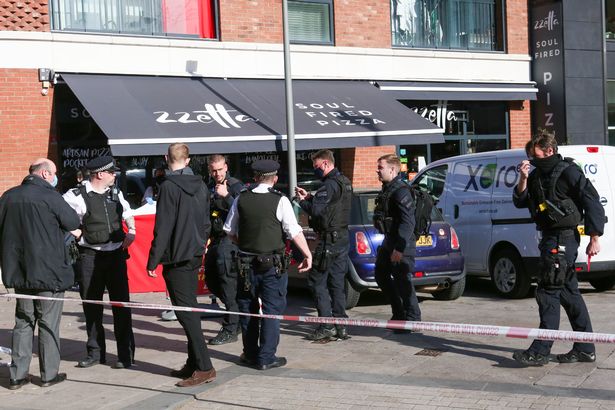 Boy, 14, stabbed to death in attack outside pizza shop as police launch murder probe