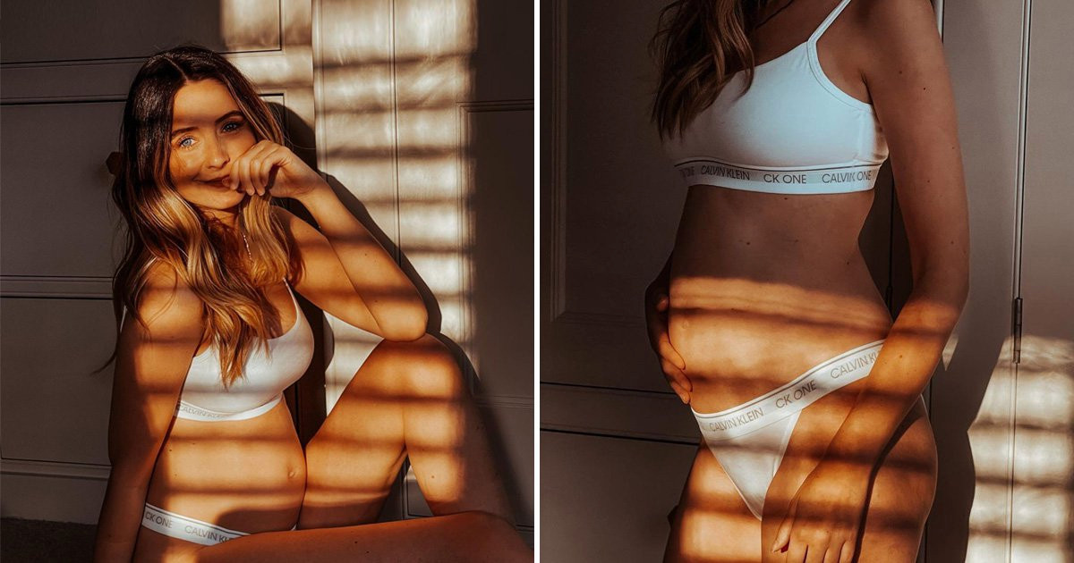 Zoe Sugg shows off baby bump as she poses in underwear to mark half way point of pregnancy