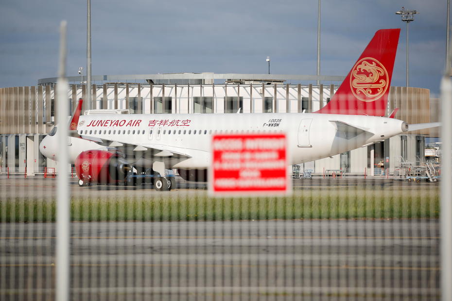 China's Juneyao Air setting up firm to invest in HNA airline assets - Caixin