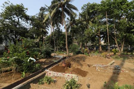 Gravediggers in India work non-stop as country sets new Covid records