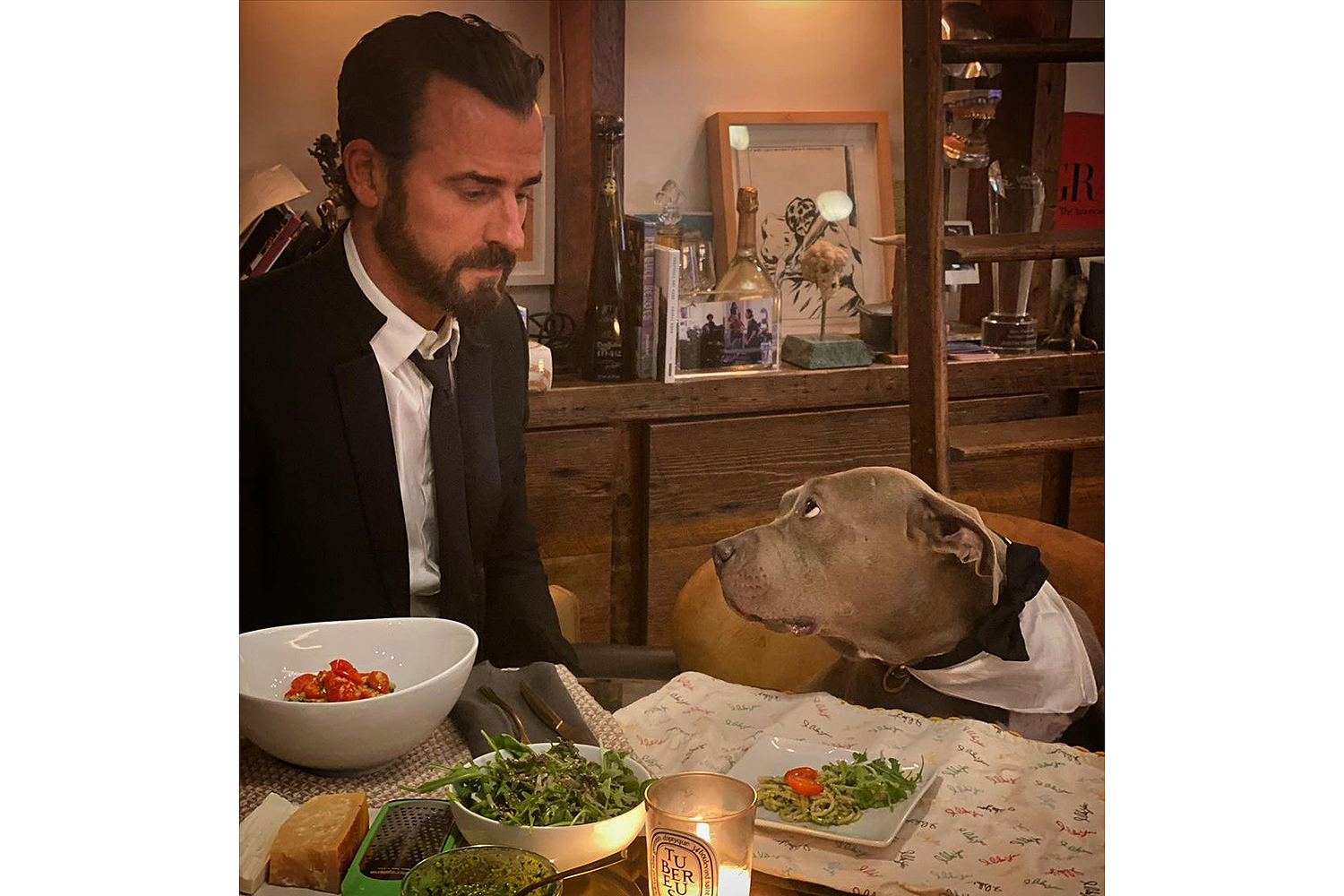Justin Theroux Explains His 'Formal Friday' Dinners with His Dog Kuma: 'What Else Was I Doing?'