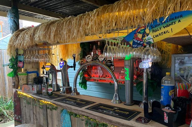 Savvy dad transforms unused garden into exotic Tiki bar - and it cost just £800