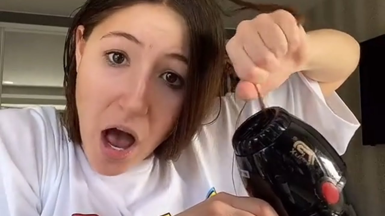 Girl's Hair Gets Stuck in hairdryer - Hilarious Reaction