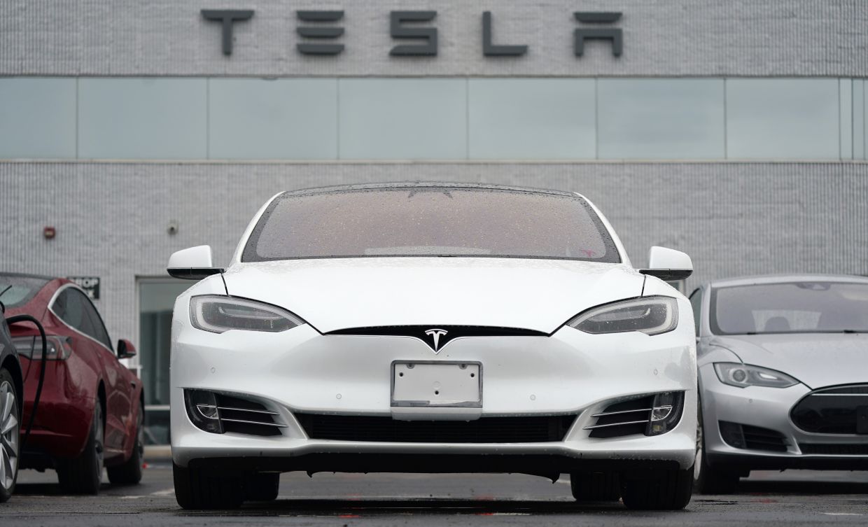 Tesla owner in fiery Texas crash was initially driving car