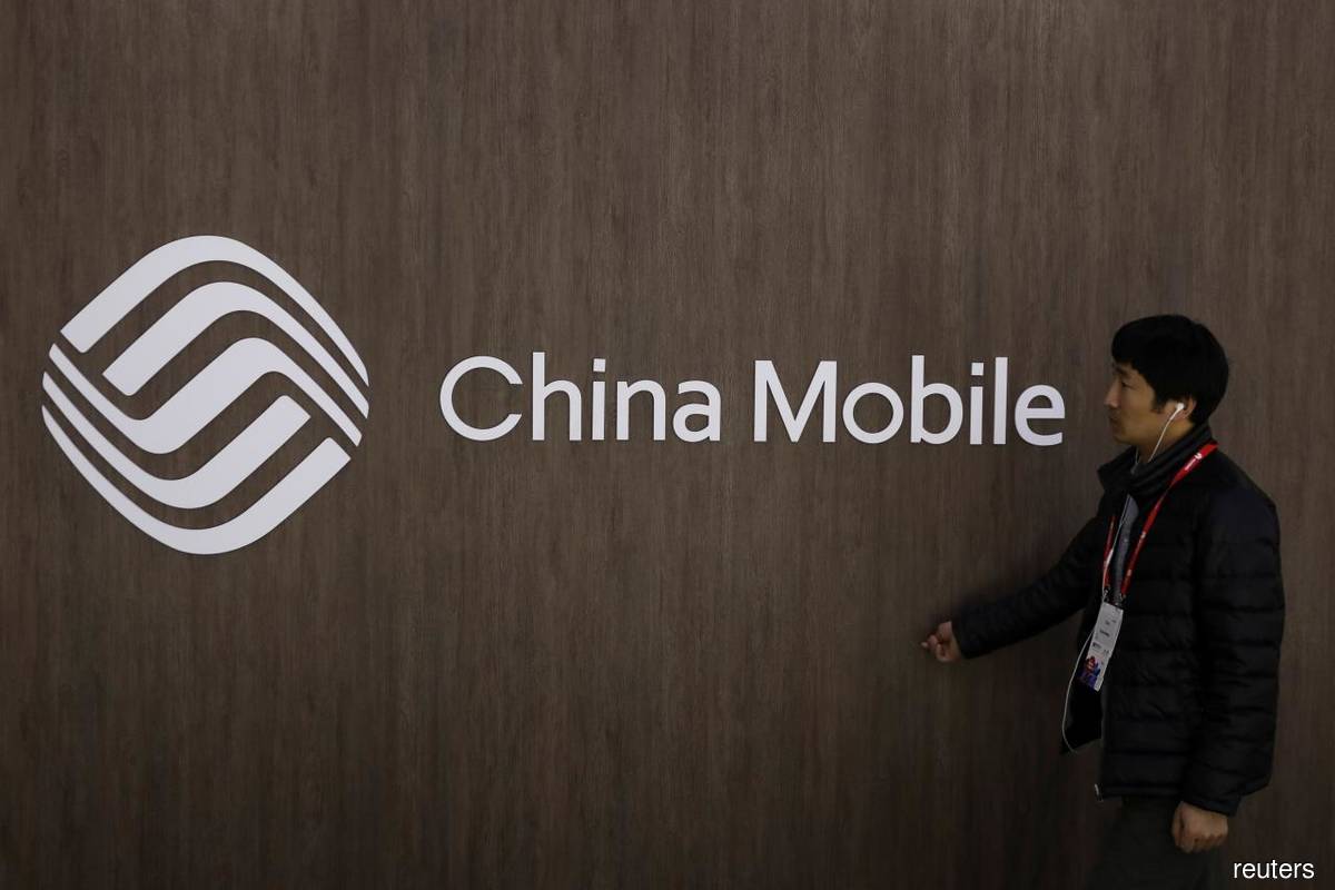 China Mobile board approves Shanghai exchange listing plan
