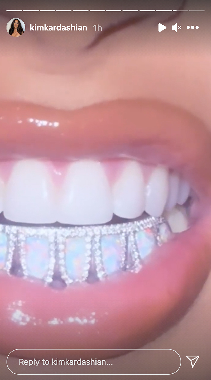 Kim Kardashian Shows Off Flashy Diamond and Opal Grill in KKW Beauty Lip Kit Campaign