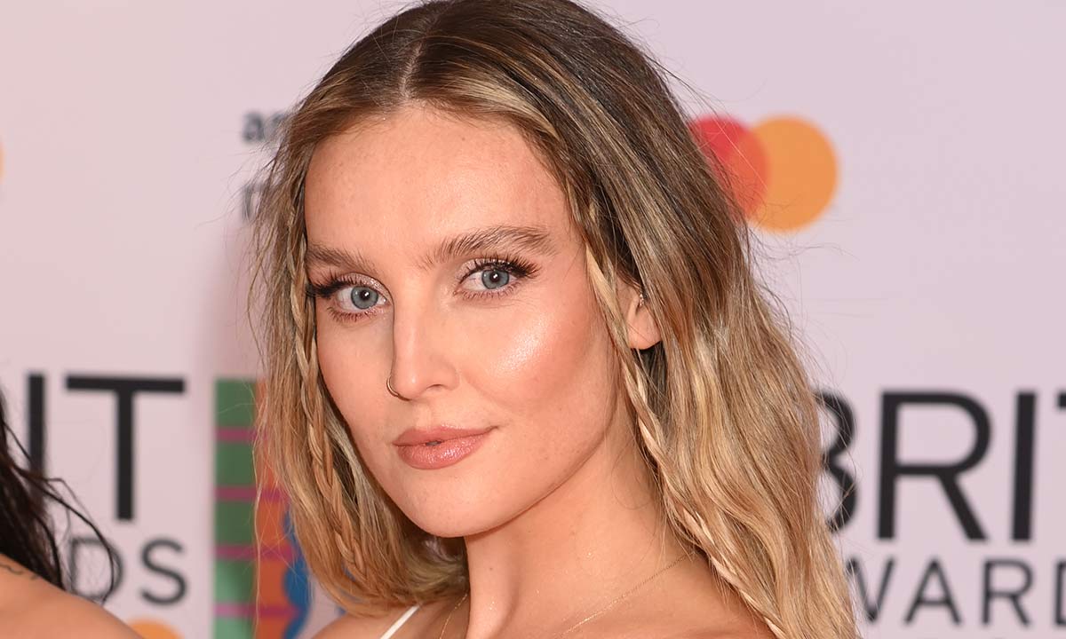 Glowing Perrie Edwards displays bare baby bump for funny home workout