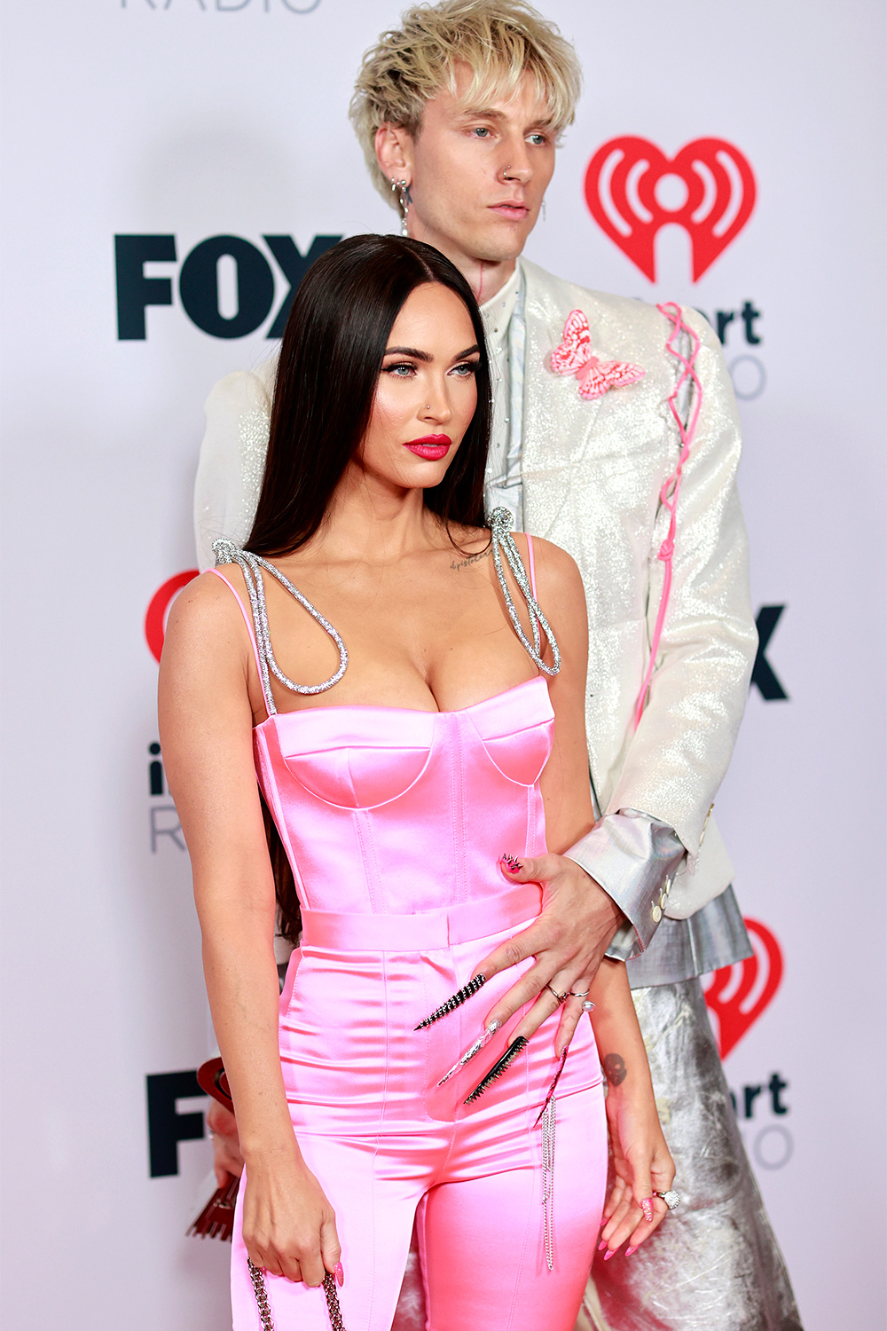 Pretty in Pink! Machine Gun Kelly and Megan Fox Match on the iHeartRadio Music Awards Red Carpet