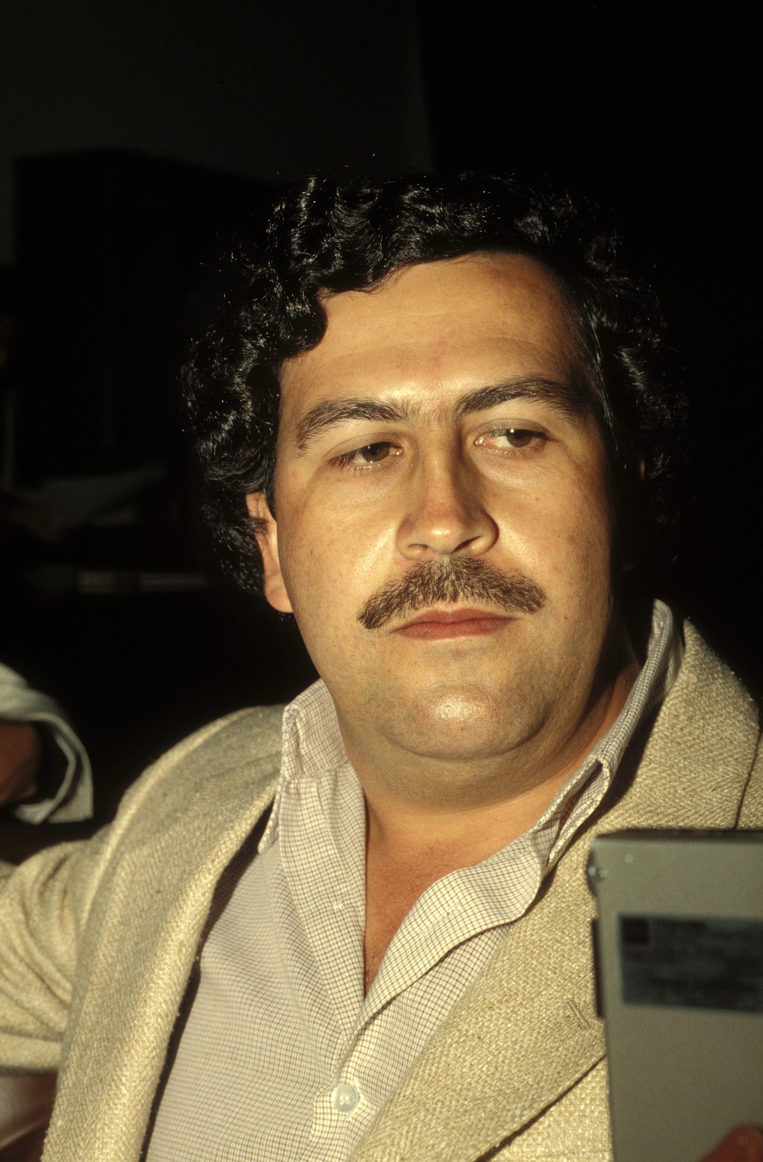 The Chilling True Story Behind Pablo Escobar's Smile In First And Final Mugshot