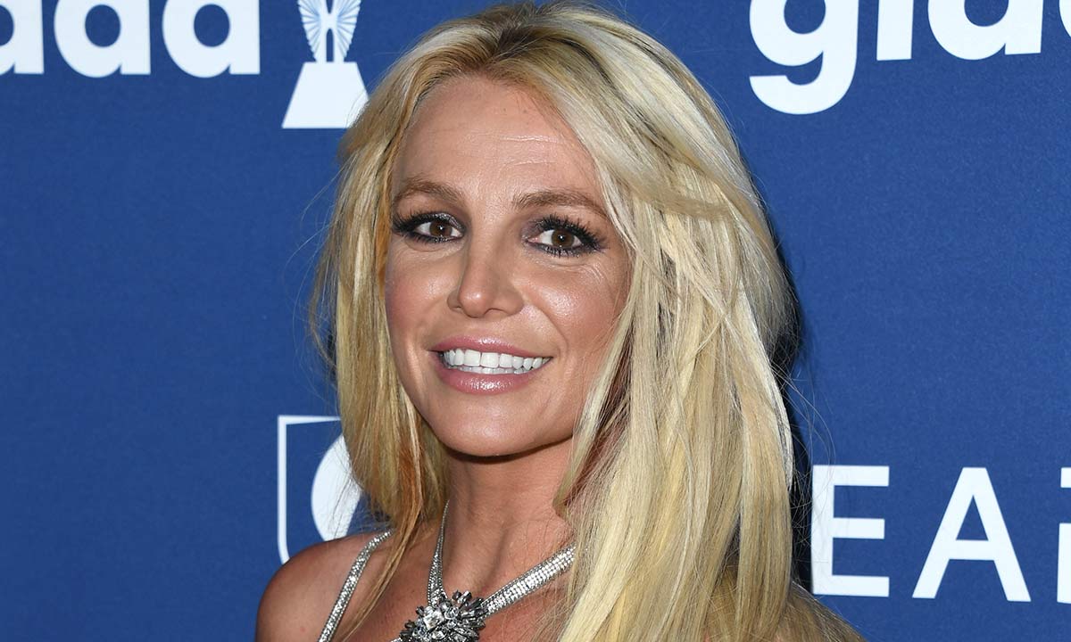 Britney Spears wows in neon swimsuit and pink hair transformation