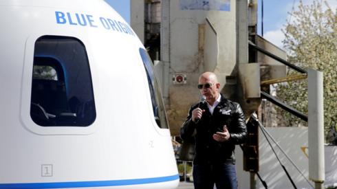 Jeff Bezos and brother to fly to space in Blue Origin flight