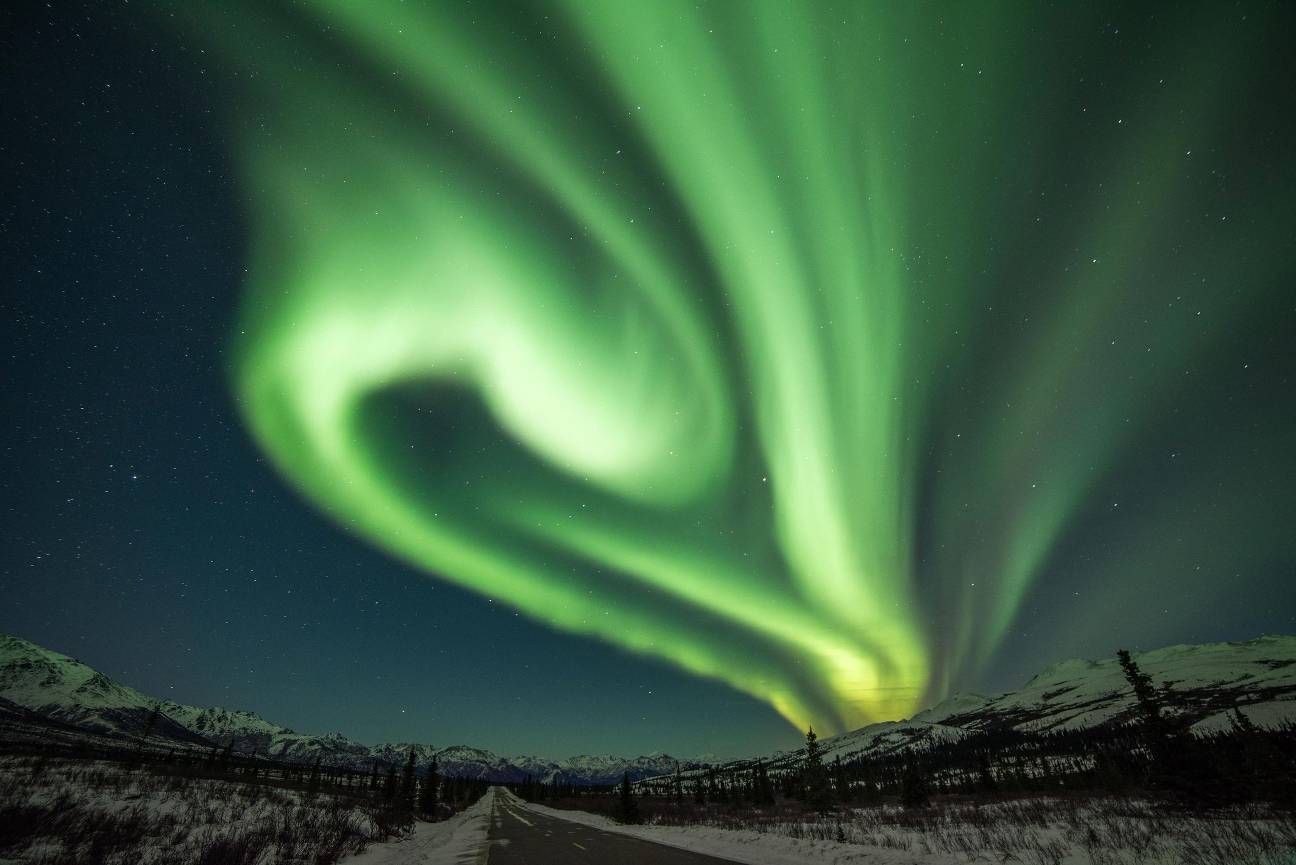 "Surfing" Particles on Alfvén Waves: Physicists Solve a Mystery Surrounding Aurora Borealis