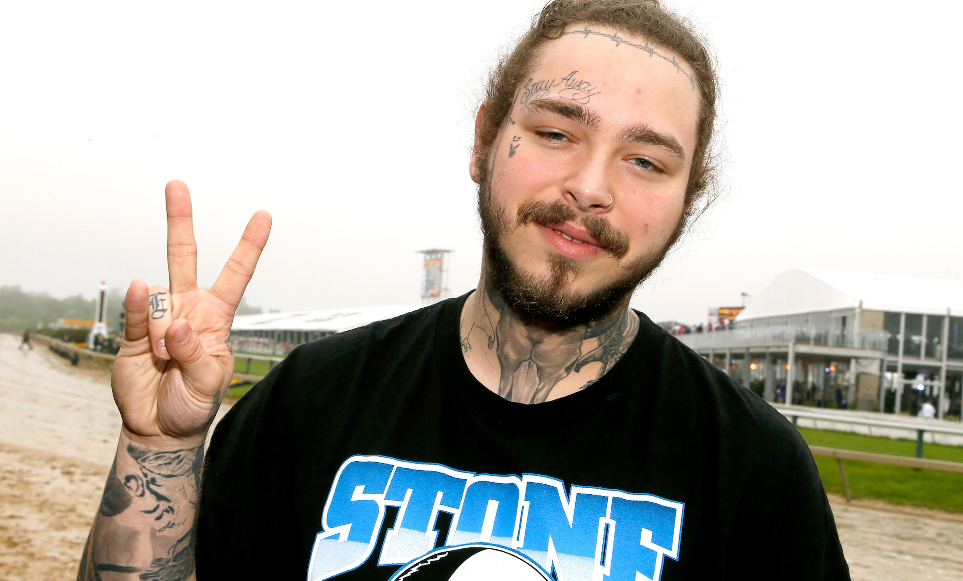 Post Malone Flashes New $1.6 Million Veneers Featuring Diamond Fangs