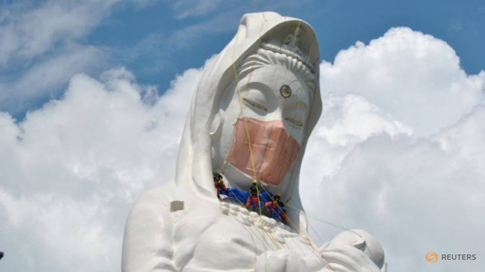 Giant Buddhist goddess in Japan gets face mask to pray for end of COVID-19