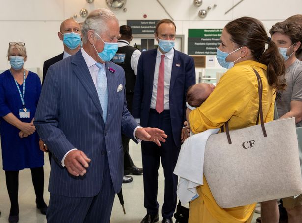 Awkward moment Prince Charles avoids 'hopeless' Matt Hancock's elbow bump