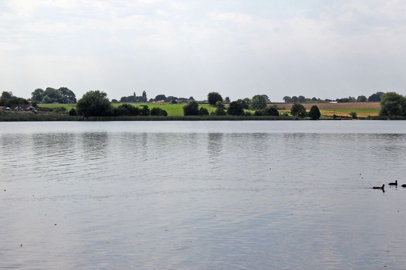 Body of man pulled from lake after he went swimming with friends during heatwave