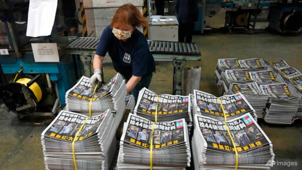 Hong Kong newspaper Apple Daily increases print run after police raid