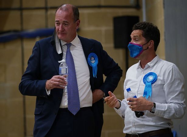 Tory's bitter swipe over by-election drubbing as Ed Davey literally knocks down blue wall