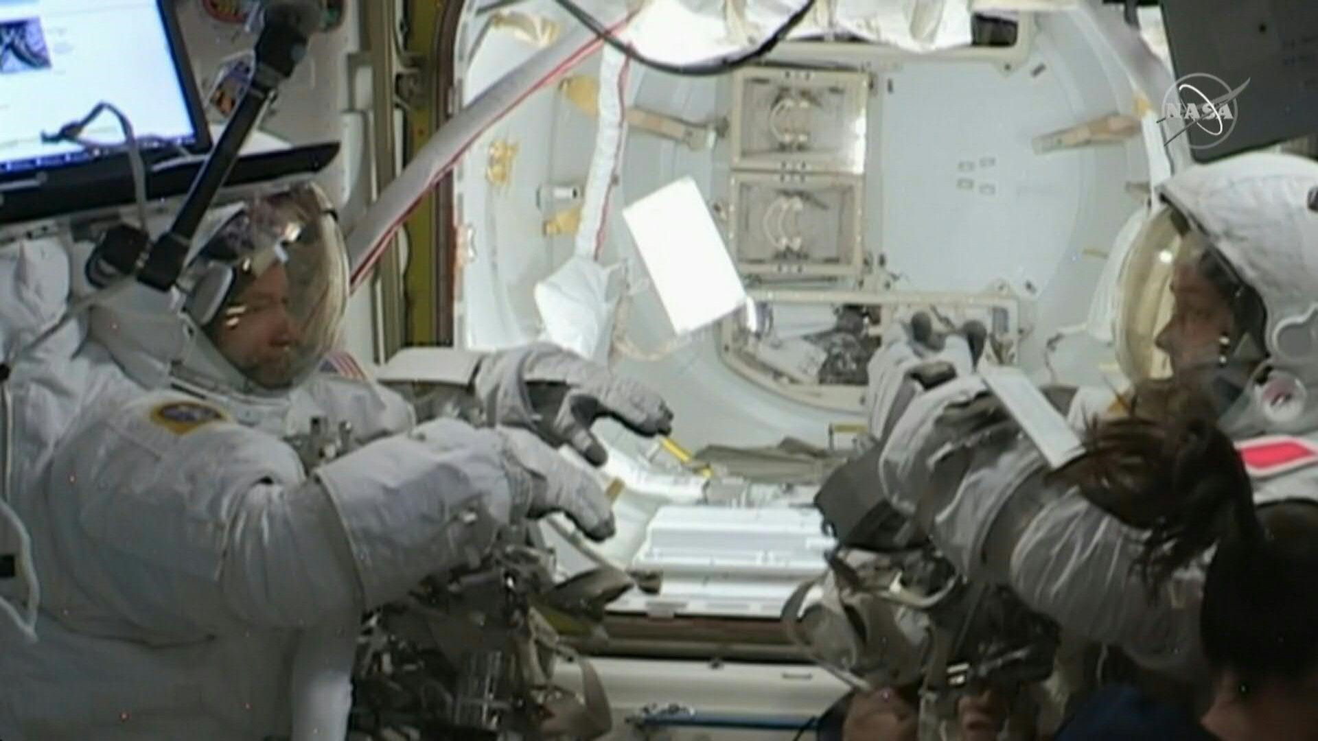 US and french astronauts back inside iss after spacewalk