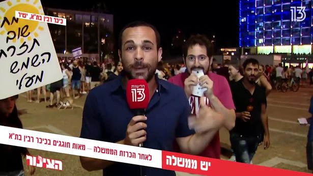 Man seizes moment to perform incredible magic act in background of live news report