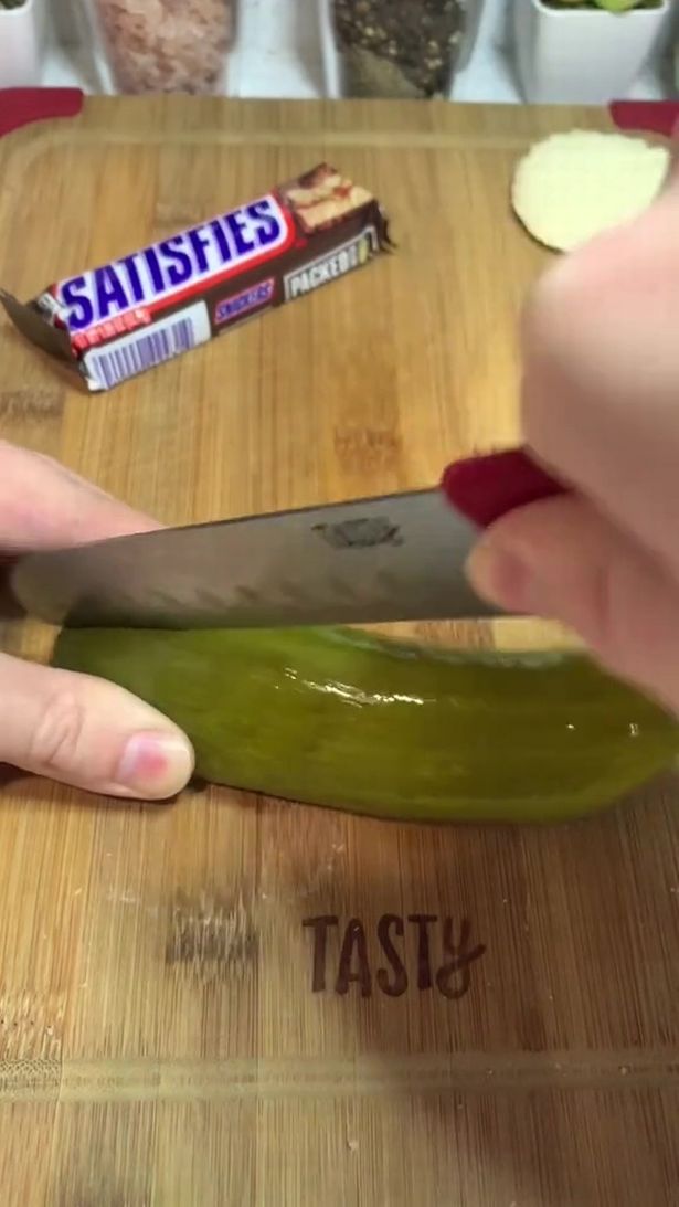 People are eating 'Snickles' made of Snicker-stuffed pickles in peculiar trend