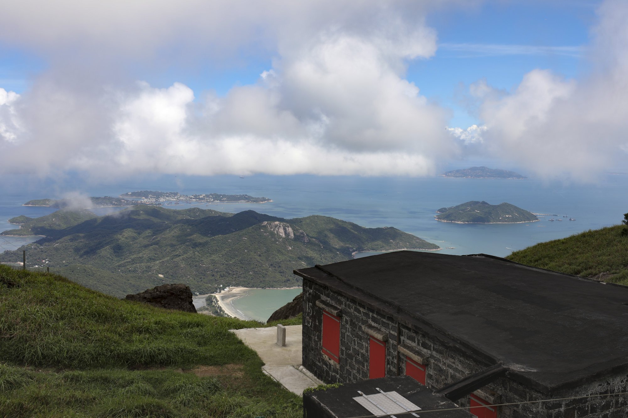 Stone cabins 100 years old on a Hong Kong mountain offer a tranquil escape and amazing views