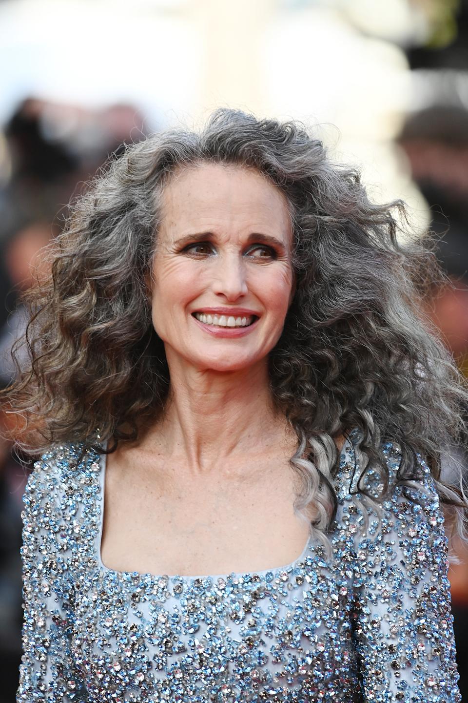 Andie Macdowell reveals summer red lipstick tip as she shows off grey hair