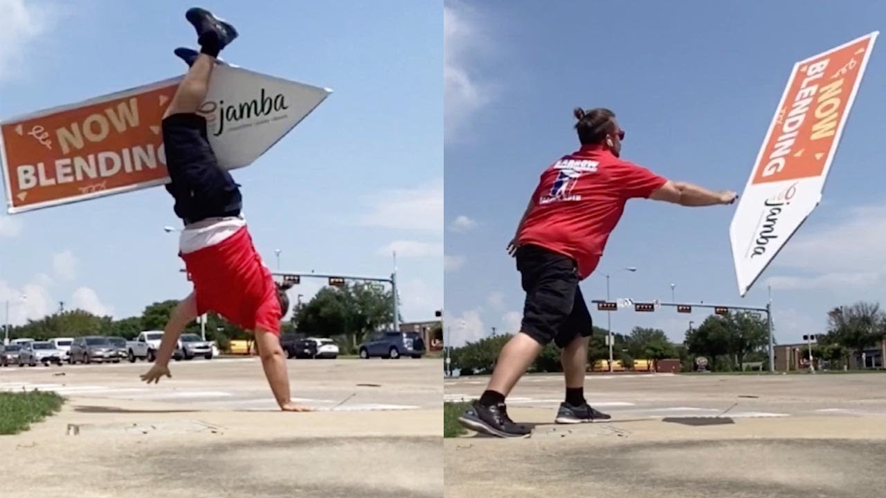 Man Has Impressive Sign Spinning Skills