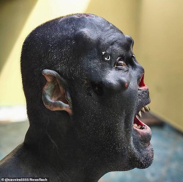 Brazilian tattoo artist turns himself into an 'ORC' by having his nose removed, ears mutilated and his skin tattooed blue