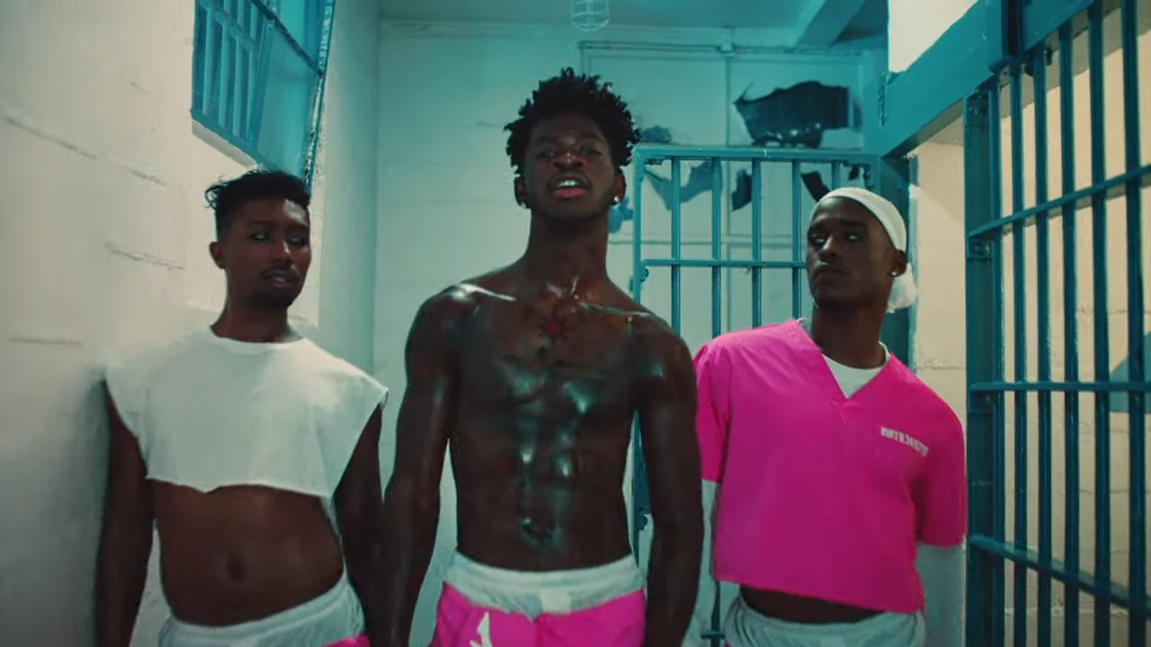 Lil Nas X dances naked in prison shower before breaking out of jail with Jack Harlow in Industry Baby music video
