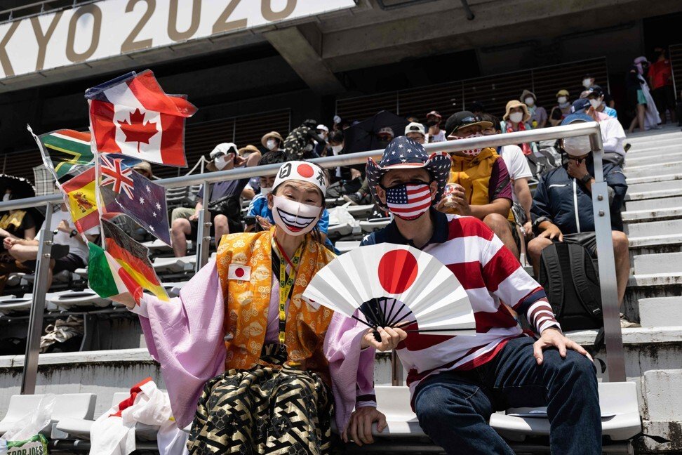 Olympic superfan gets creative in cheering on coronavirus-hit Tokyo Games