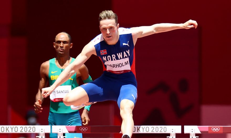 Olympics: Karsten Warholm wins men's 400m hurdles in world record time