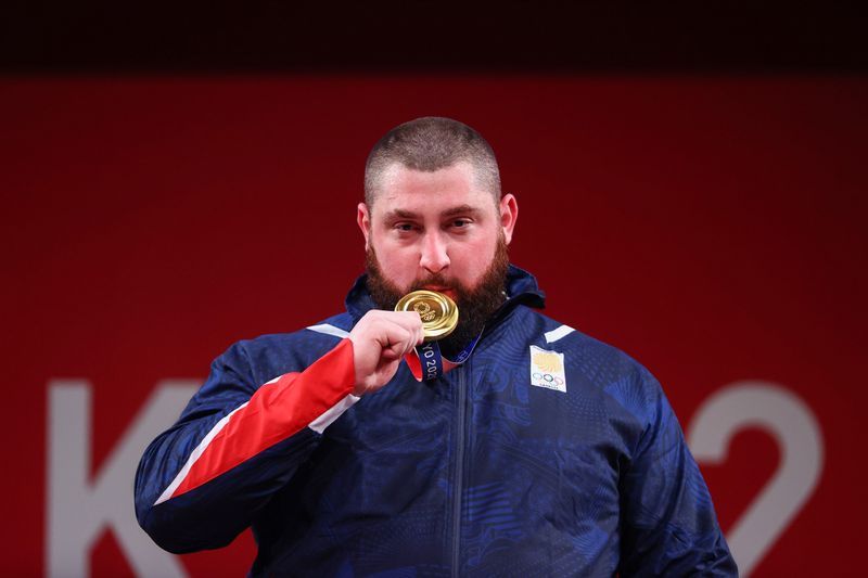 Olympics-Weightlifting-Georgia's Talakhadze breaks world record to conquer men's super heavyweight class