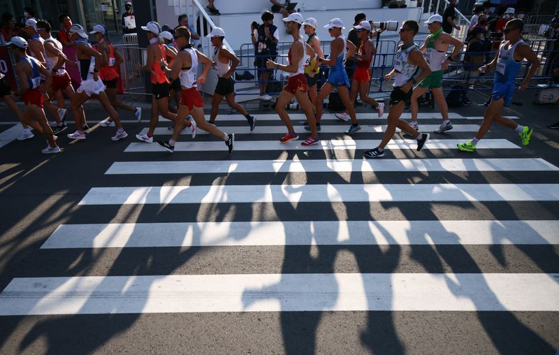 Olympics-Athletics-Walkers slam decision to scrap 50km race