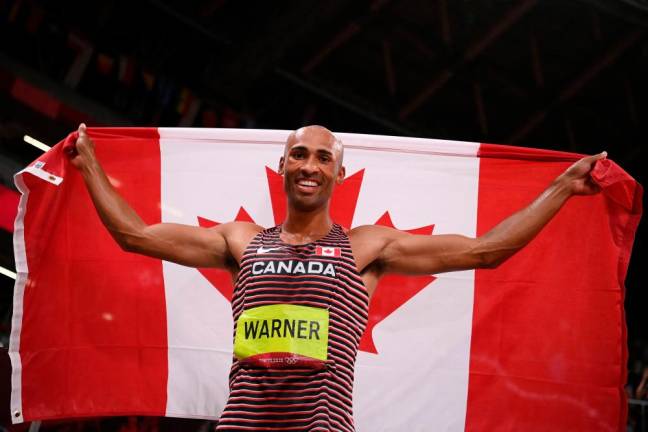 Warner breaks Olympic record to win Decathlon gold at Tokyo Olympics