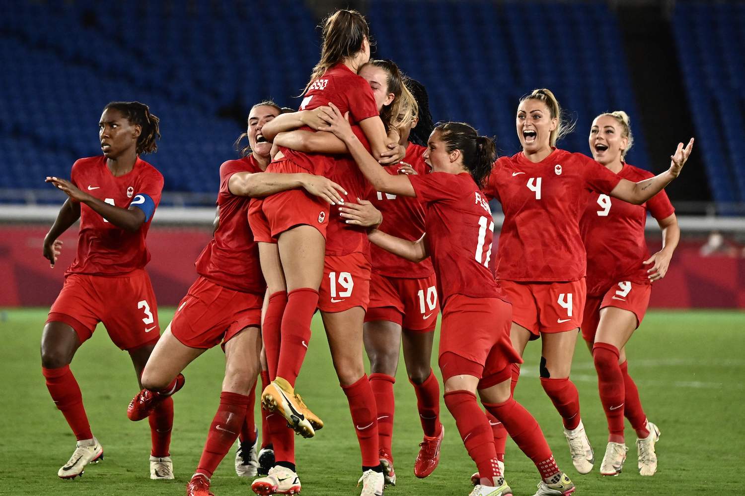 Canadian women win football gold in shootout