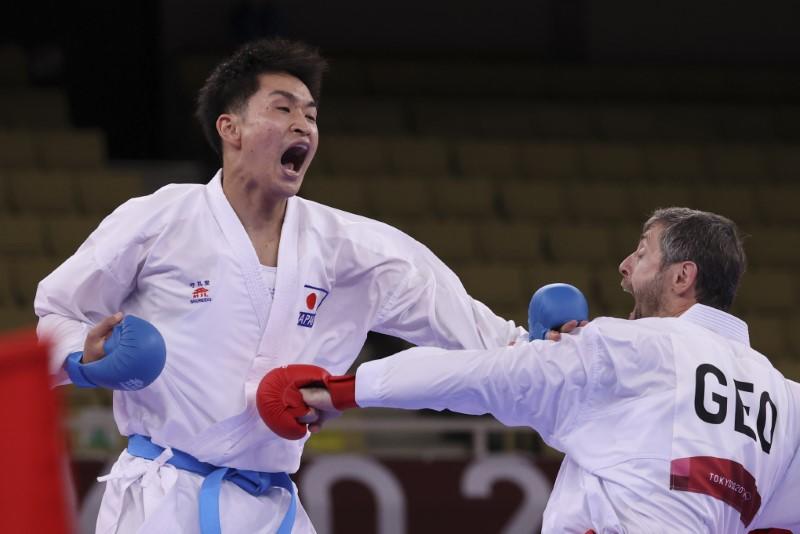 Olympics-Karate-Unconscious Ganjzadeh gets gold as opponent disqualified
