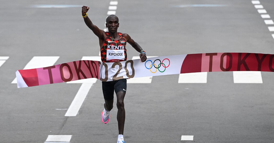 Eliud Kipchoge finished far ahead of the pack to defend his men’s Olympic marathon title.