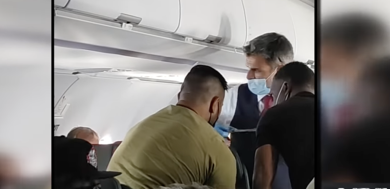 video-shows-flight-attendants-duct-taping-13-year-old-to-seat-after-he