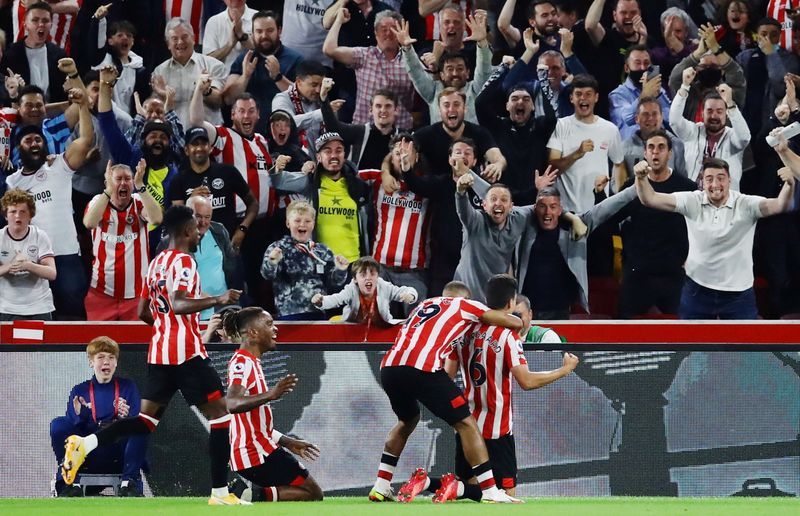 Soccer-Fans back with a bang as Brentford provide night to remember