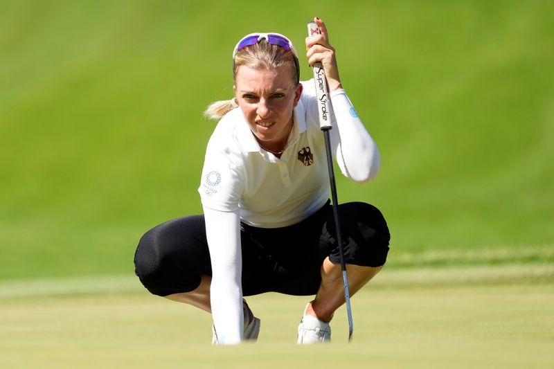 Golf-Popov relishing title defence at AIG Women's Open