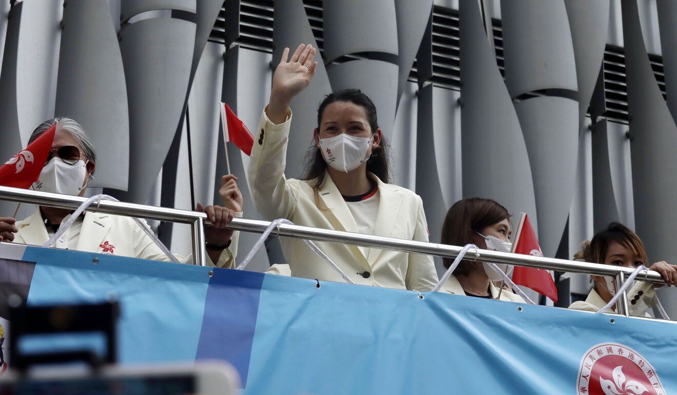 Bus parade lets Hong Kong’s Olympic heroes drink in cheers as city welcomes them home