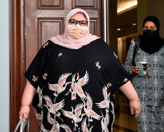 Siti Bainun charged with neglecting down syndrome child | Nestia
